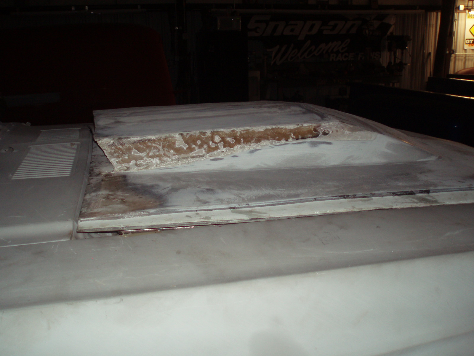 Initial fiberglass hood restructuring