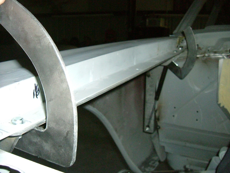 Hidden hinges support side-opening hood design