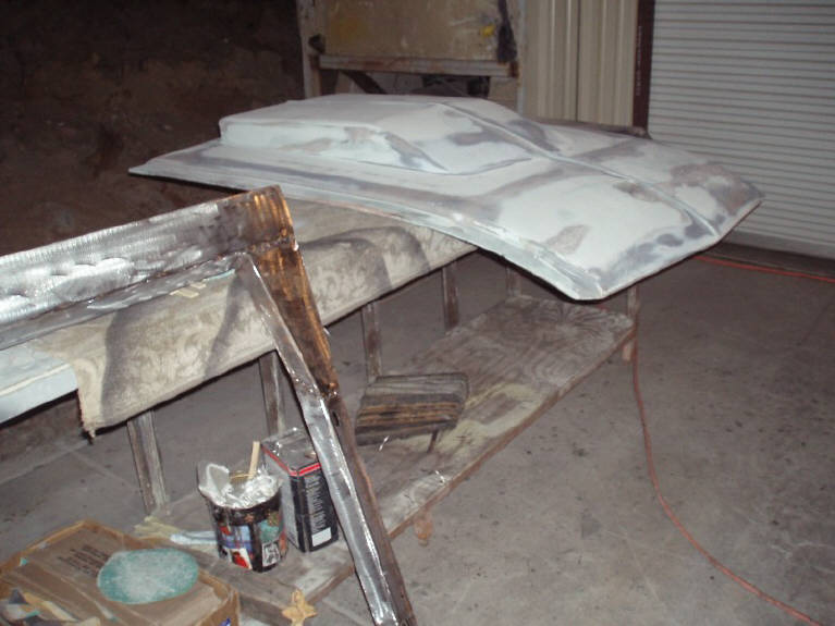 Modified hood reflecting the extended front profile