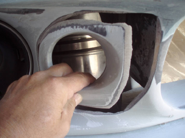 Headlight bucket area showing extensive bodywork required for the new front-end geometry