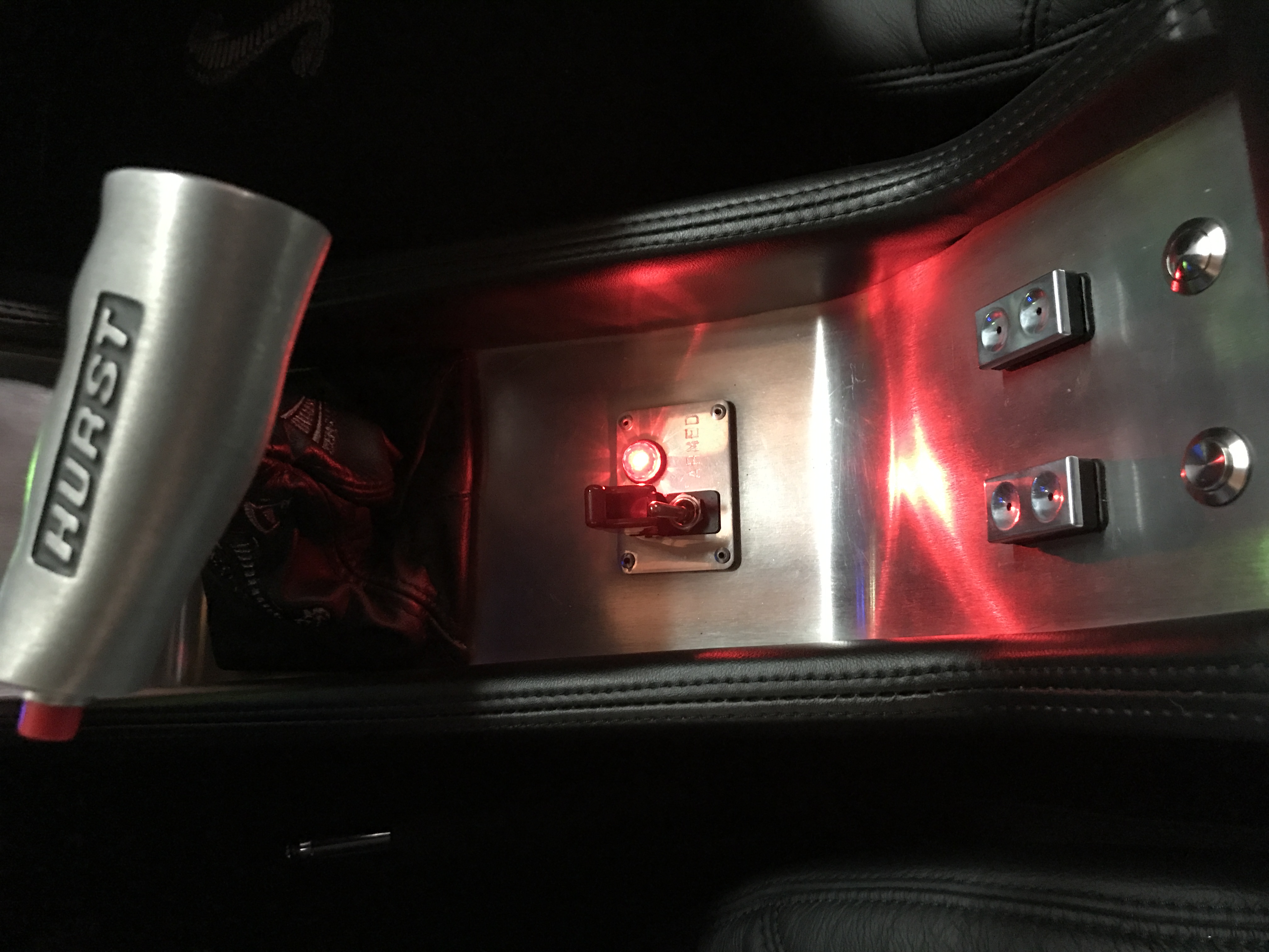 Nitrous oxide arming switch in lower console