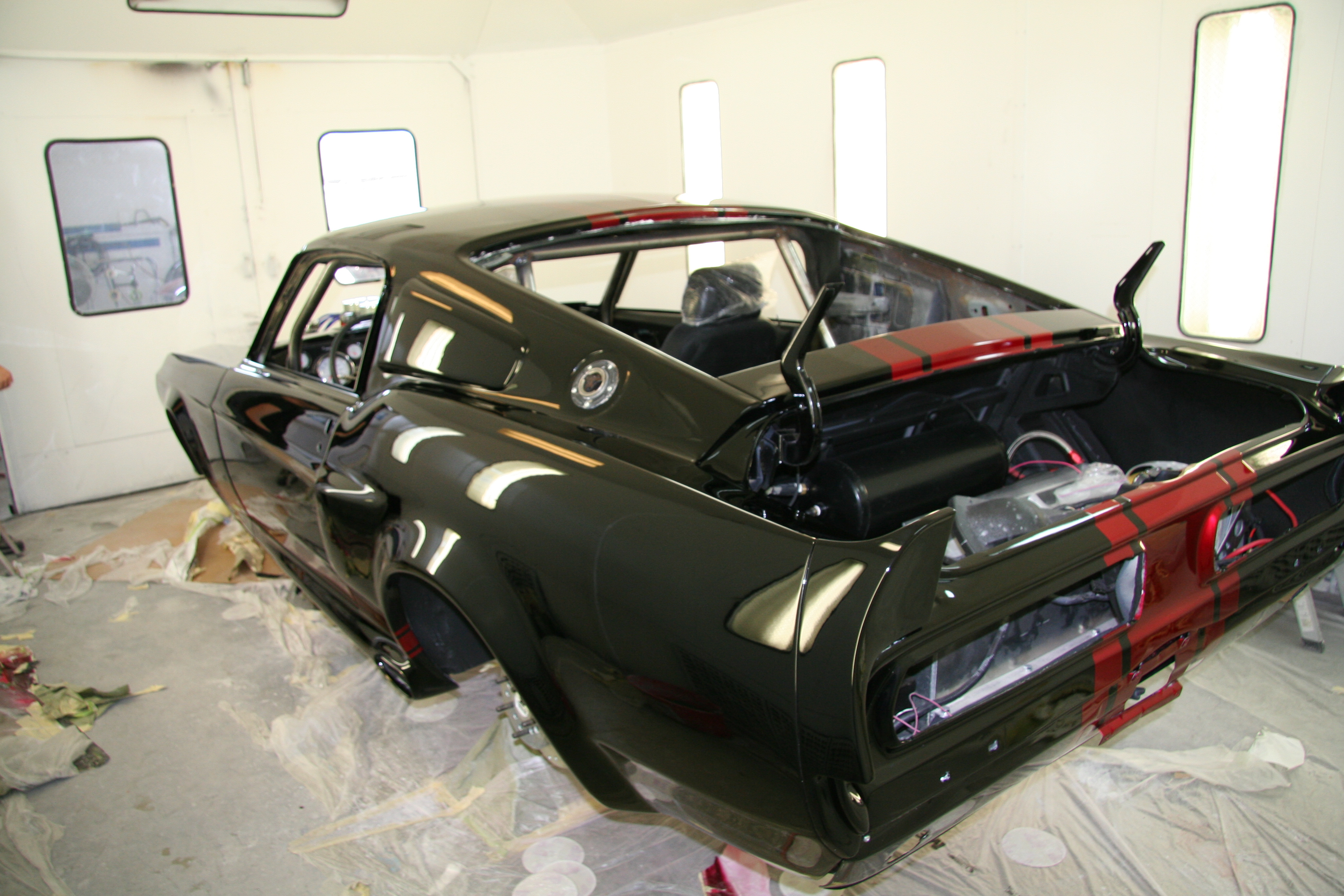 Black base coat receives multiple layers of clear