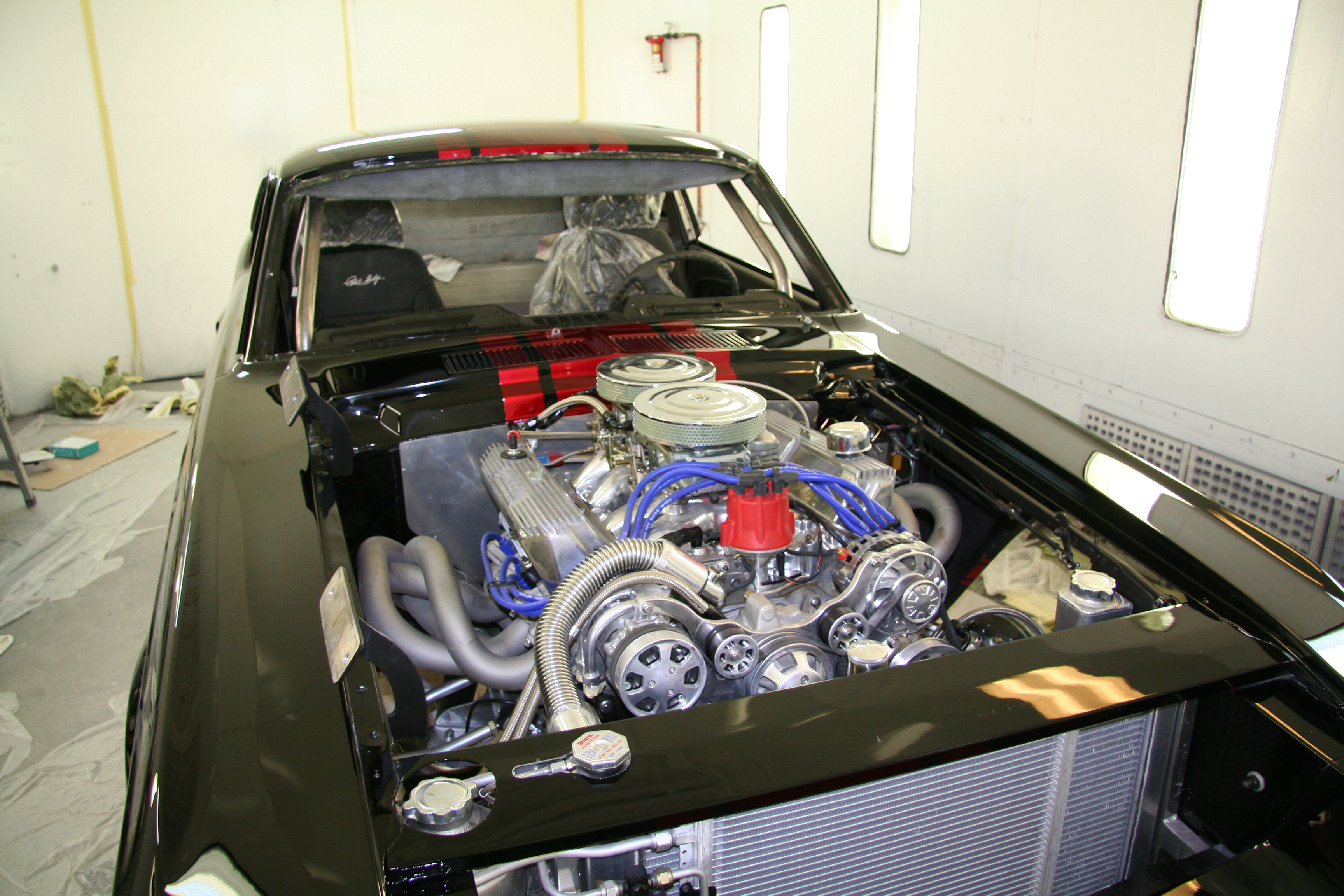 Engine bay finished in black with stripes carried through the firewall