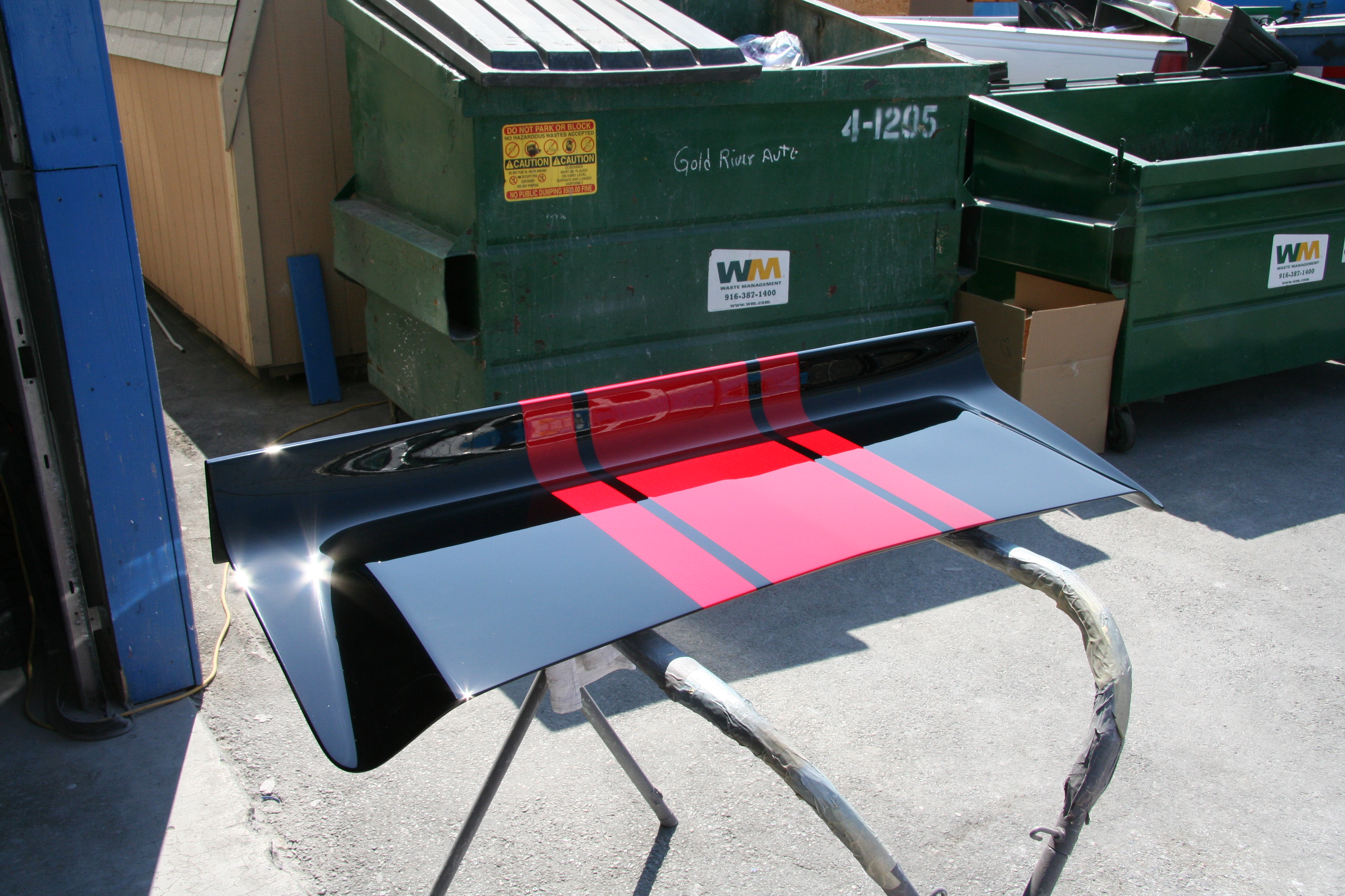 Trunk lid and spoiler painted off the car